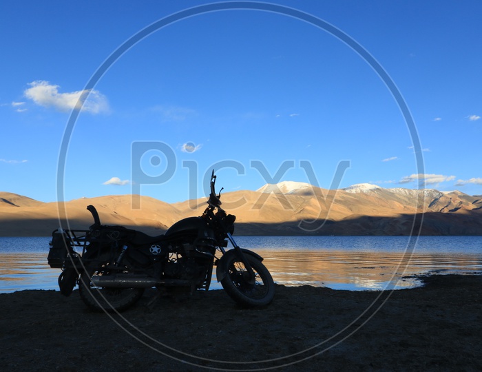 Silhouette of a Bike at River Valley In Leh