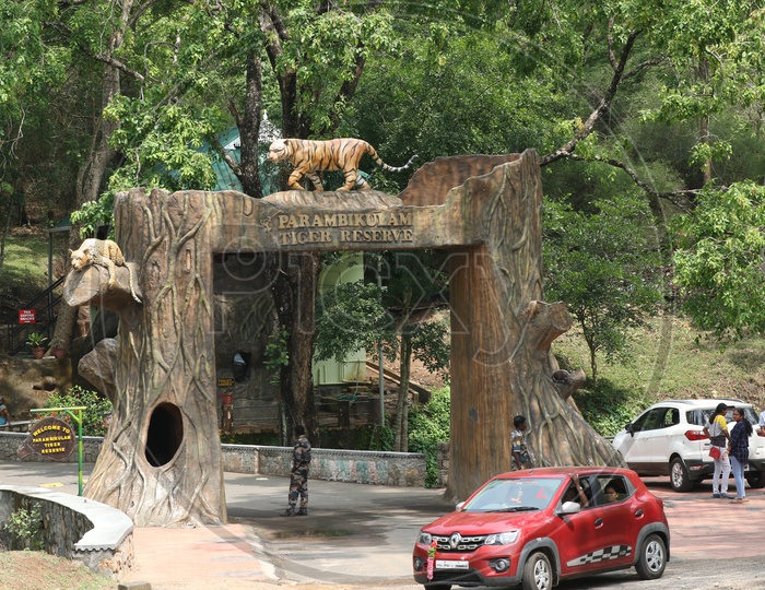 Entrance arch and road at Parambikulam Tiger Reserve