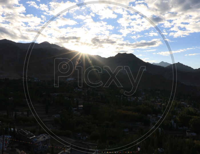 Landscape of beautiful Mountains of Leh with sunstar