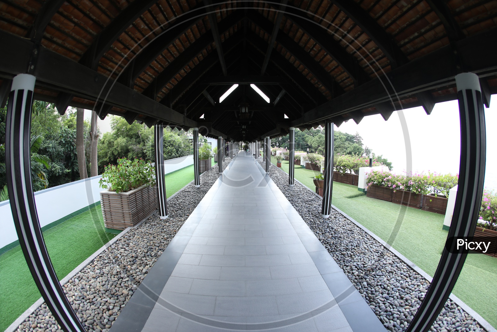 Corridor With tile Huts in a Resort