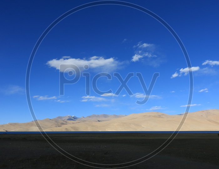 A Valley View of Leh With Lake , Sand Dunes and Blue Sky