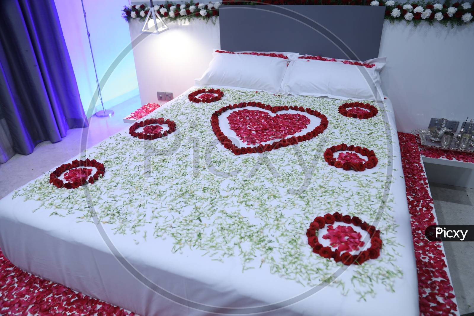 Indian Bed Decorated With Flowers For Newly married Couples