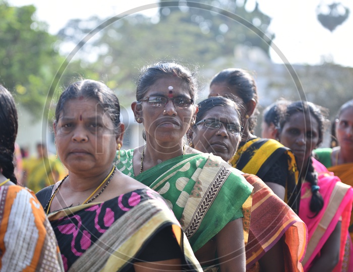 People standing in queue to vote in Telangana