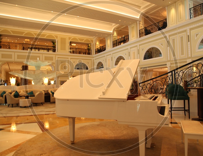 A piano in the interior of a luxury hotel