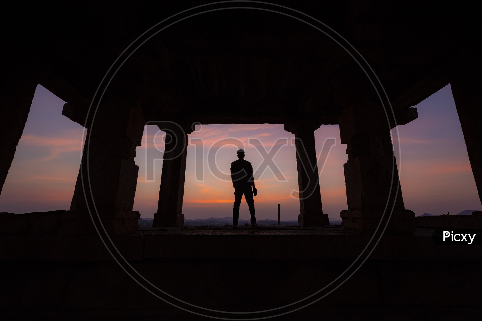 Silhouette of a man during sunset in Hampi
