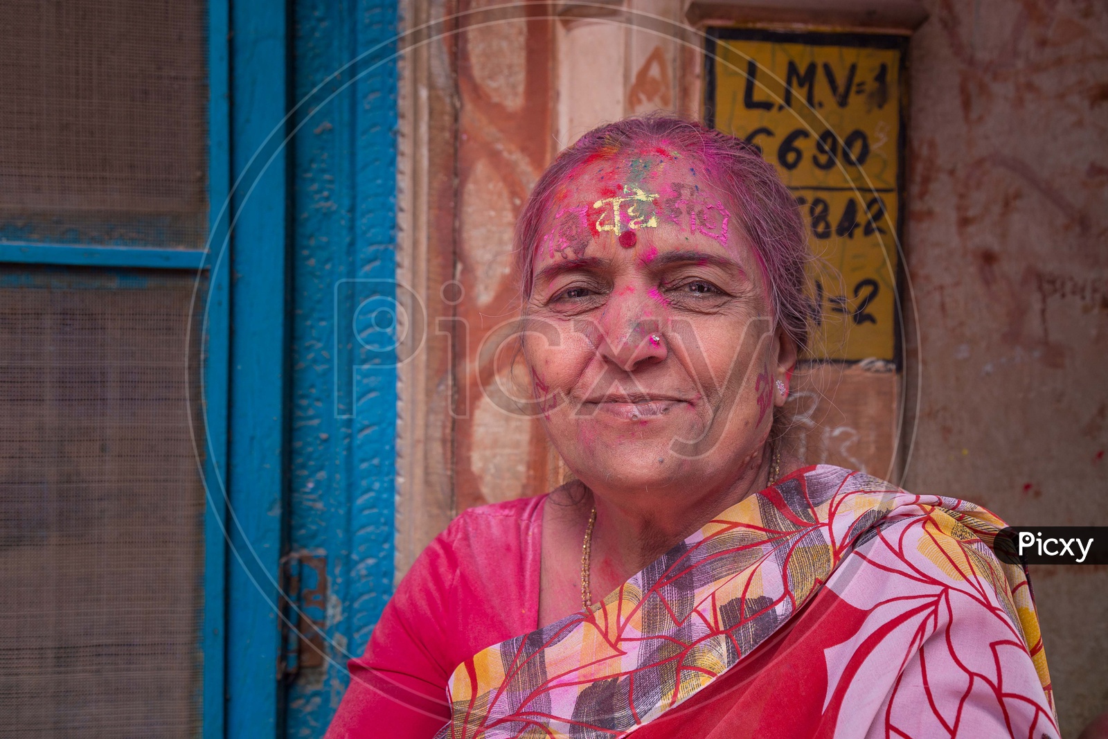 Portrait of Indian women with coloured face