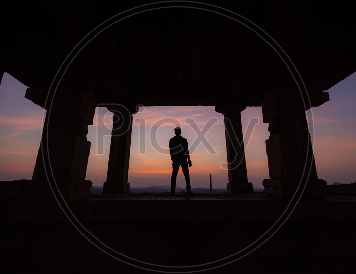 Silhouette of a man during sunset in Hampi