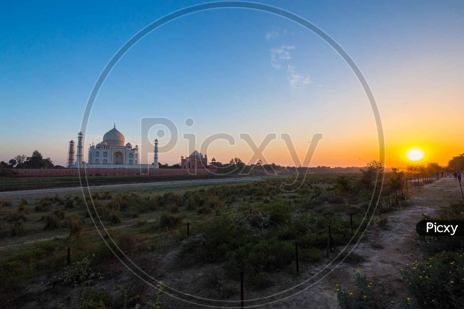 Landscape of Taj Mahal with beautiful sunset in the Background