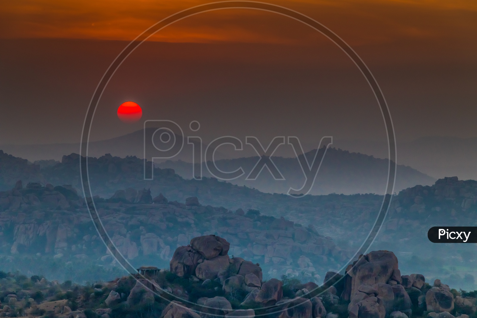 Beautiful sunset view in Hampi with Mountains