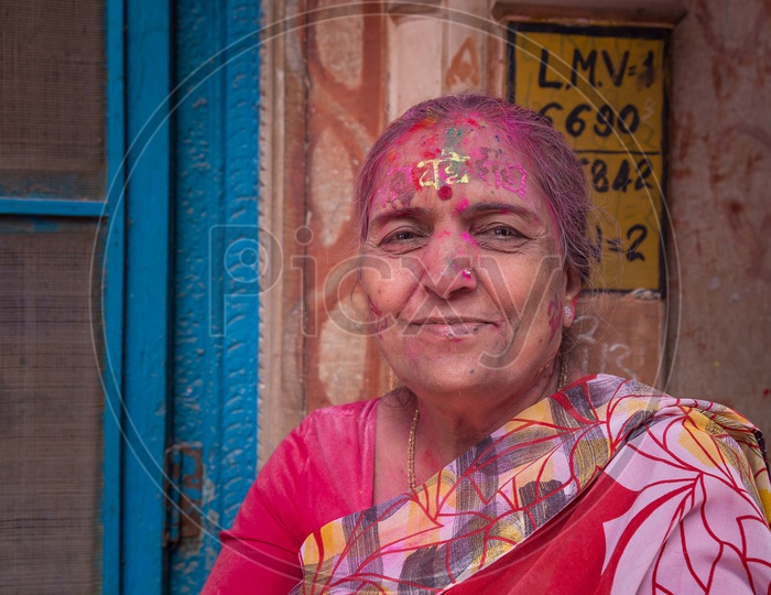 Portrait of Indian women with coloured face
