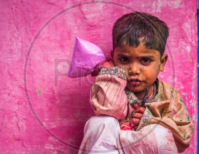 Holi/Indian Festival - Kid with colors/colours on face