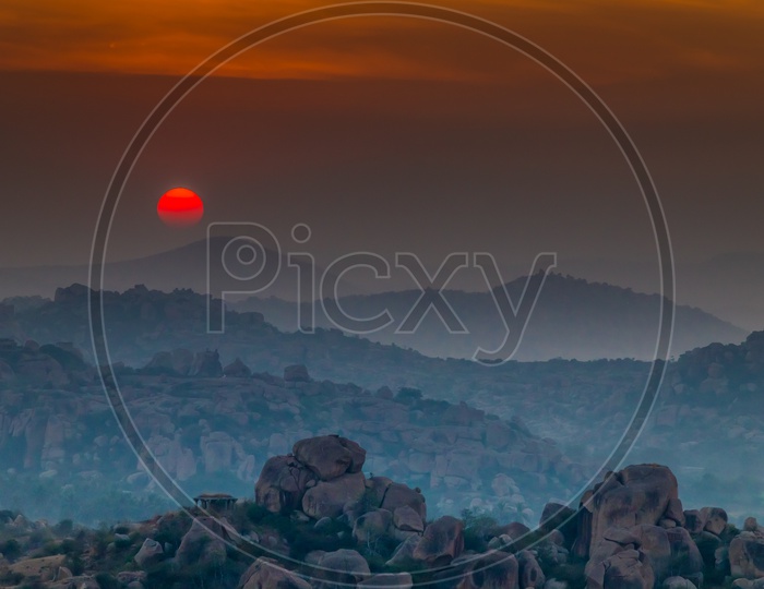 Beautiful sunset view in Hampi with Mountains