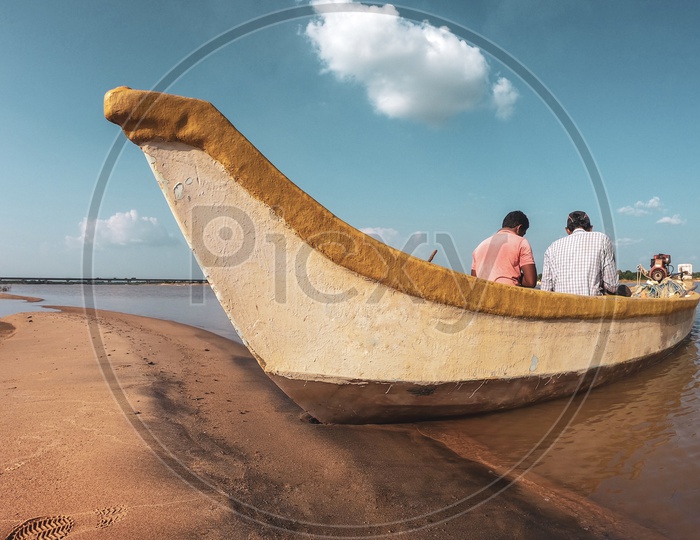 Two men sitting in the boat