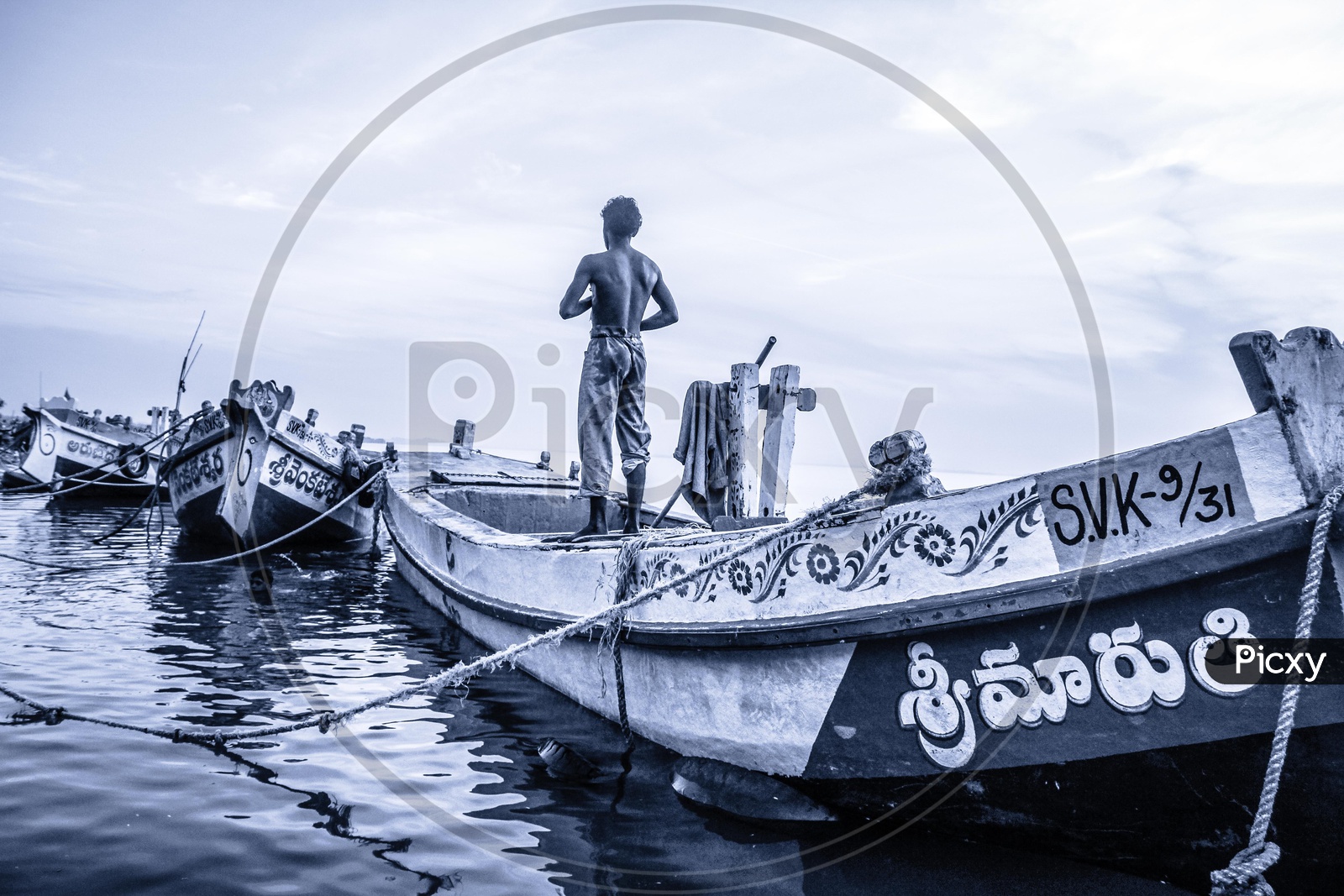 Man standing on a boat at Rajahmundry