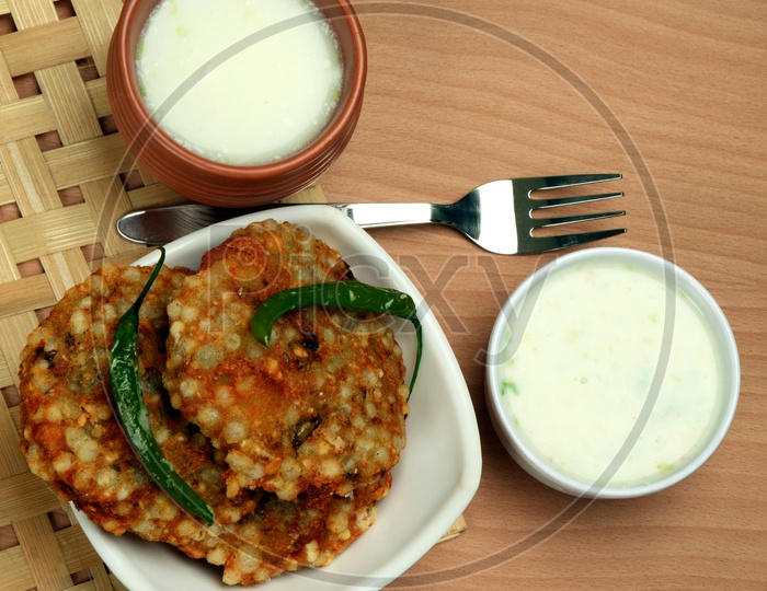 Sabudana vada with green chili and butter milk