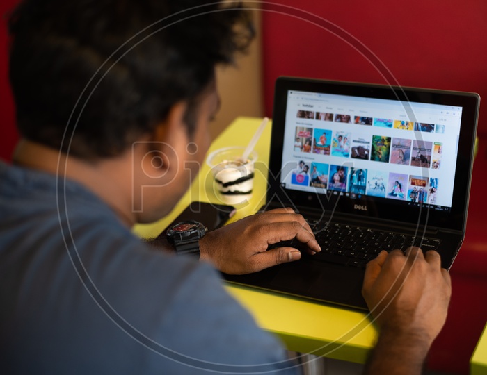 Indian Youth Searching Movies on Hotstar   in Laptop