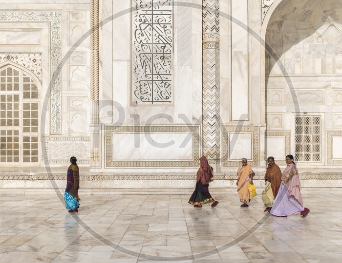 Women walking in Taj Mahal