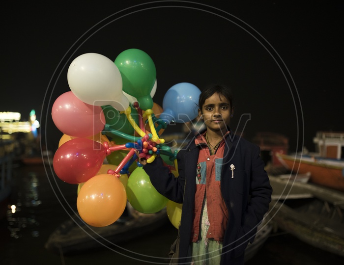 Girl Selling Balloons in Varanasi
