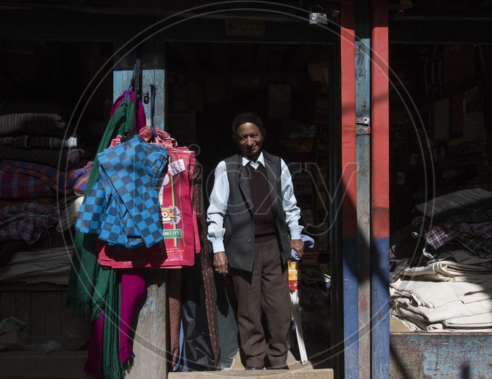 Kashmiri Old man in a Clothes Shop