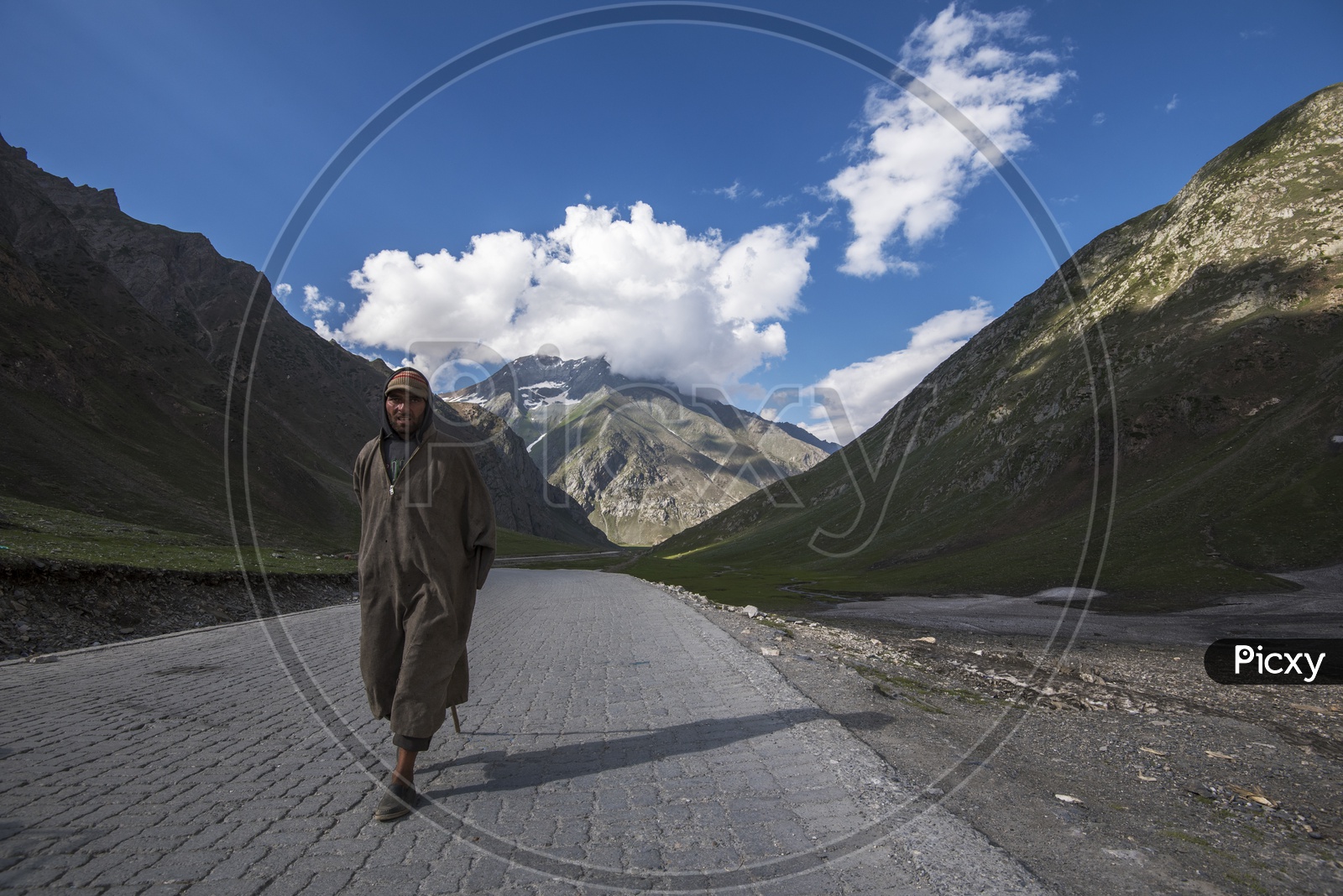 Kashmiri Man walking on Road