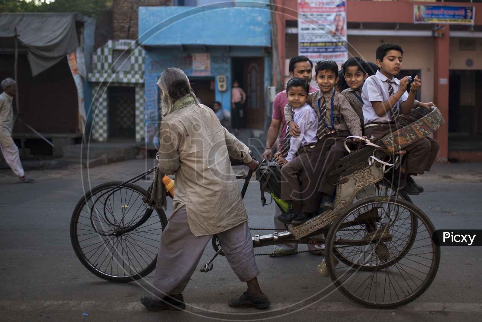 School Children in a Rickshaw