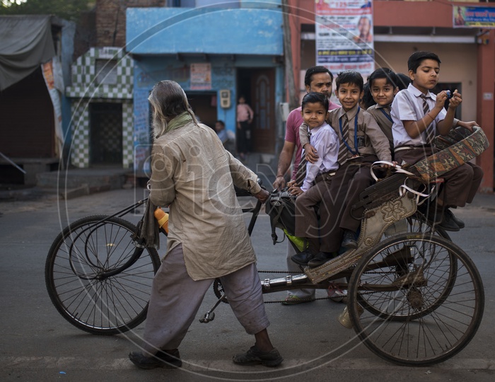 School Children in a Rickshaw