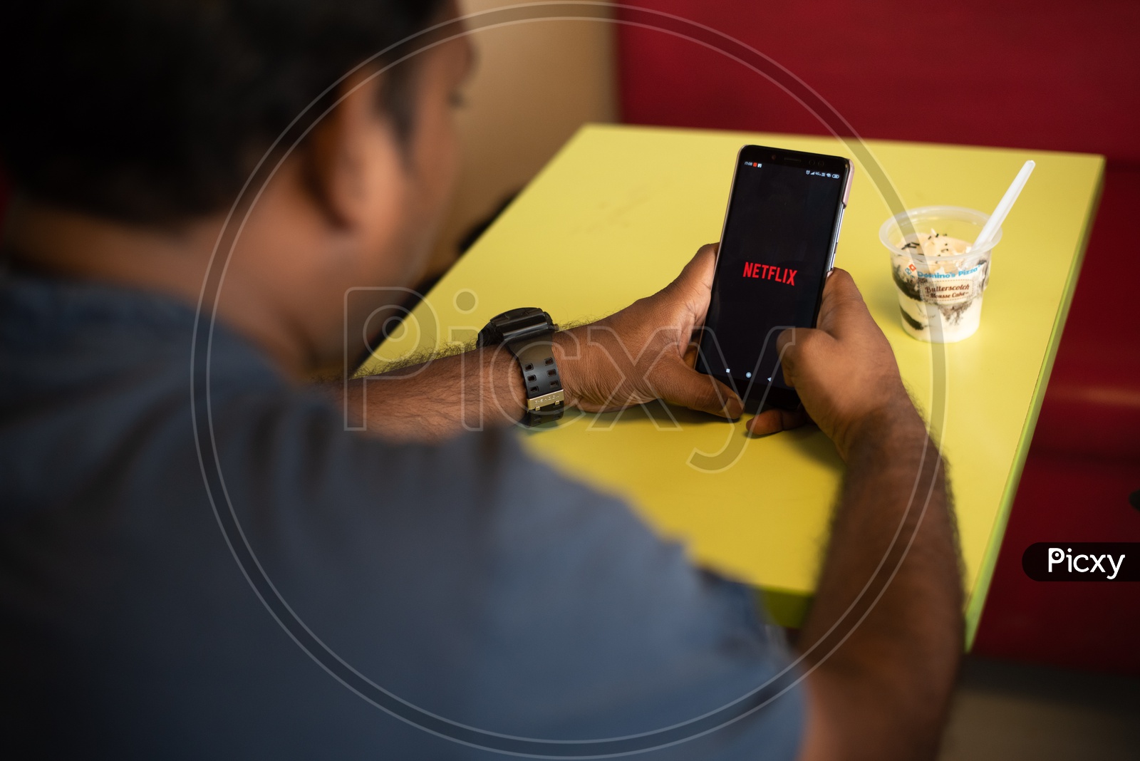Indian Youth Using Netflix  on Smart Phone
