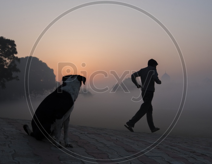 Man Jogging in early morning near Taj Mahal