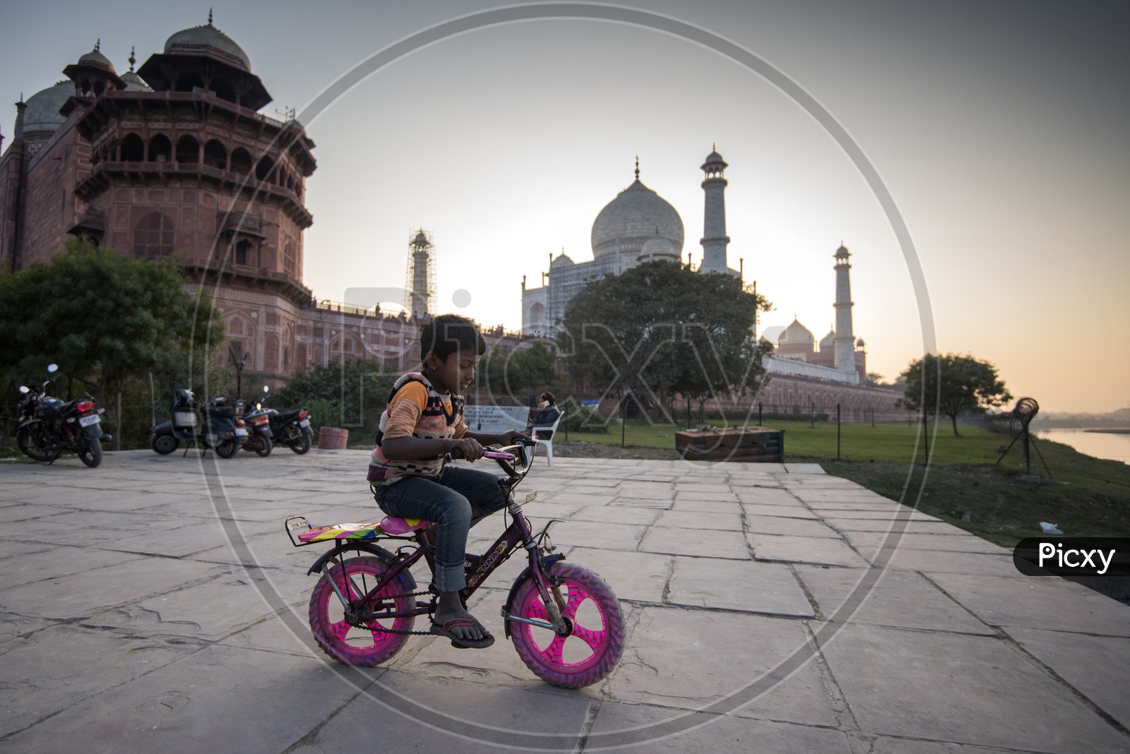 Kid Cycling near Taj Mahal