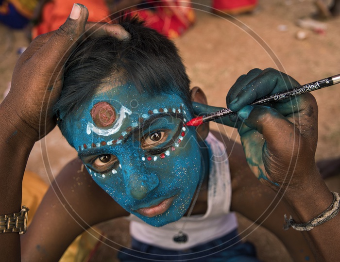 Boy getting ready for the Festival of Kali Kaveripattinam
