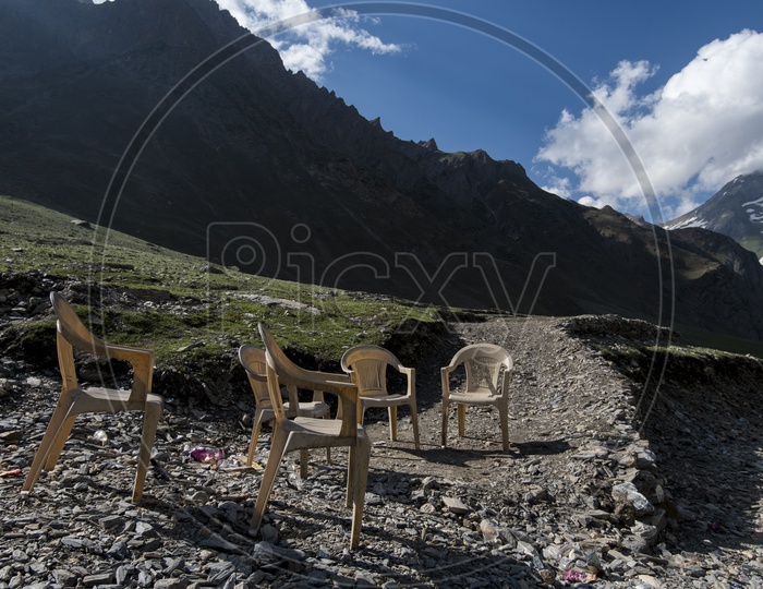 empty chairs at the mountains