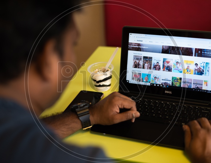 Indian Youth Searching Movies on Hotstar   in Laptop