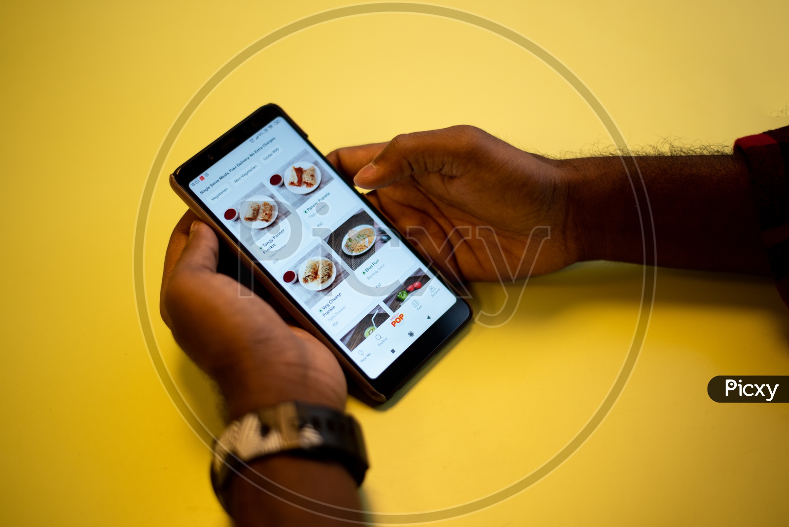 A man using Swiggy, an Online food delivery app