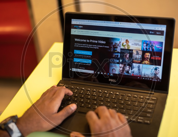 A man using Amazon Prime Video, Online Streaming Website on his Laptop PC