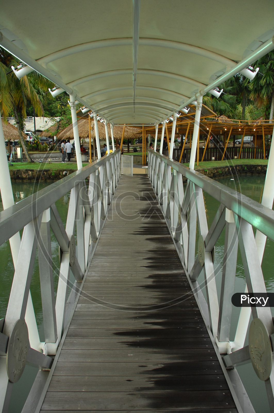 Boardwalk of the bridge alongside a resort