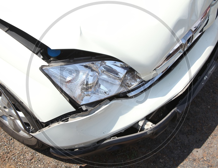 Wrecked Head Light Of A  Car After Crash