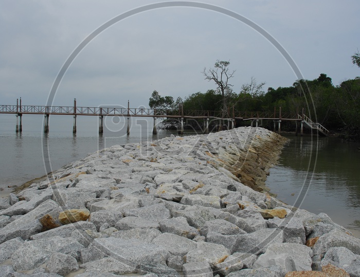 Rock path to Pier along the beach