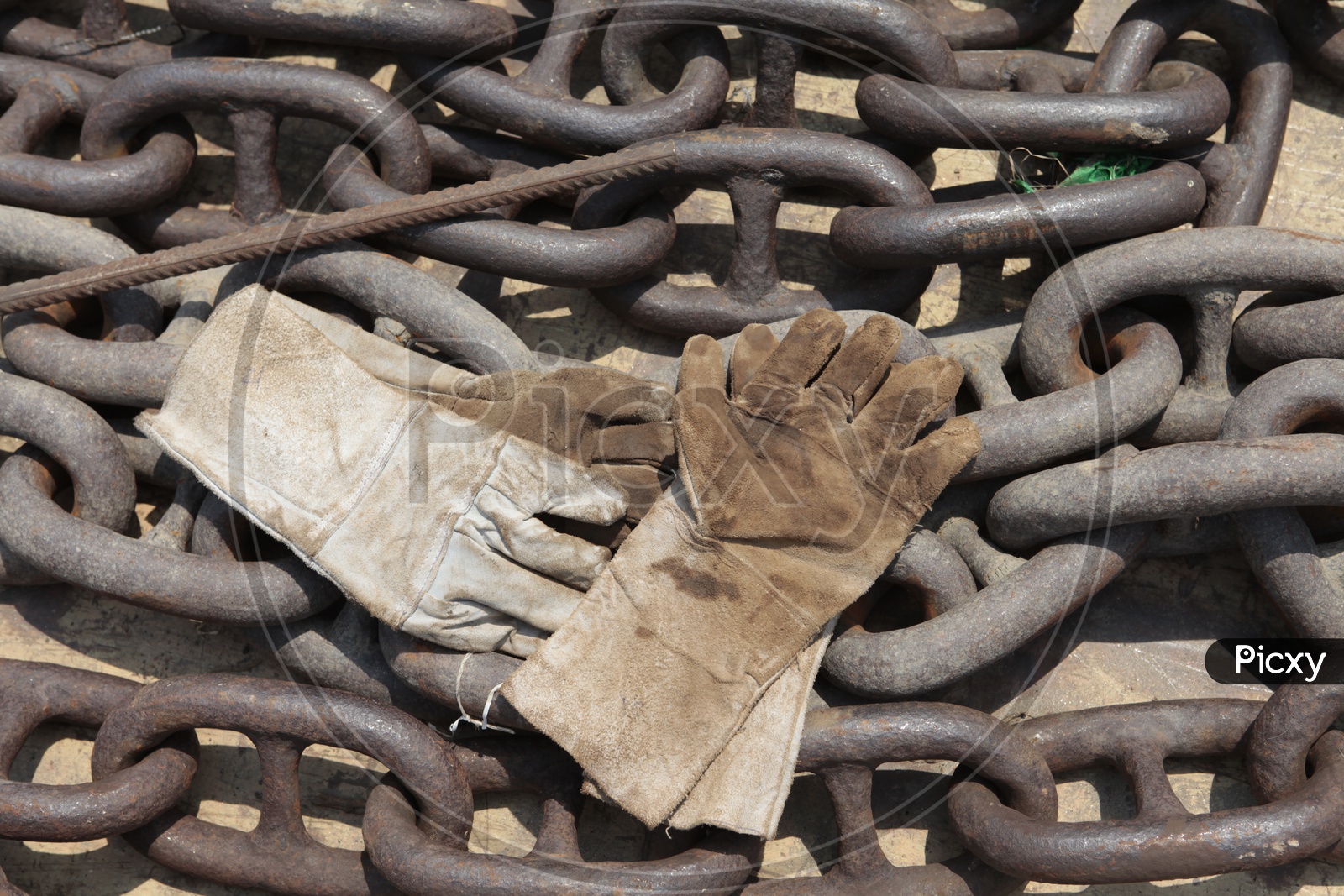 Safety Hand Gloves on the chain in a ship