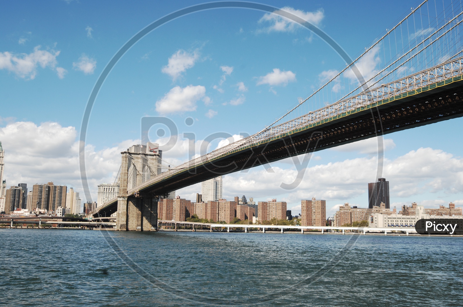 Beautiful view of Brooklyn bridge with river in the foreground