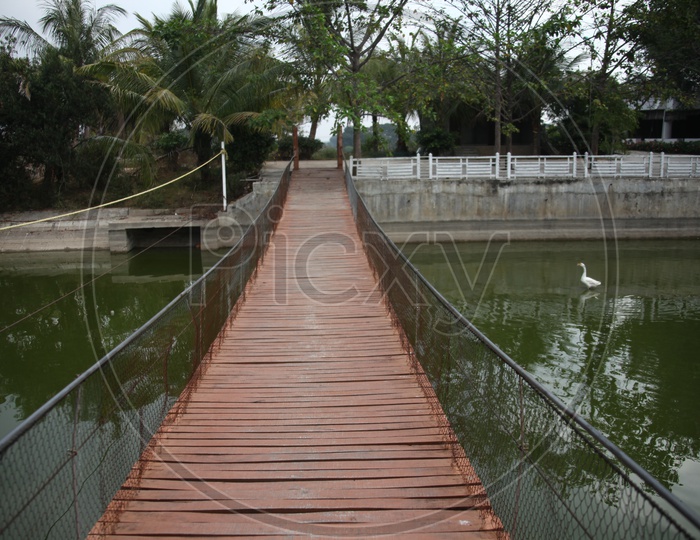 A wooden bridge over a canal