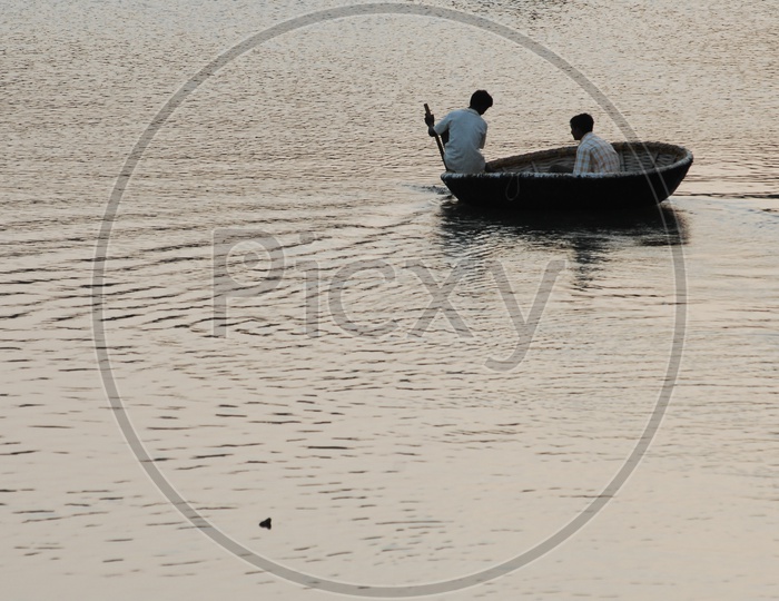 Men rowing in Coracle
