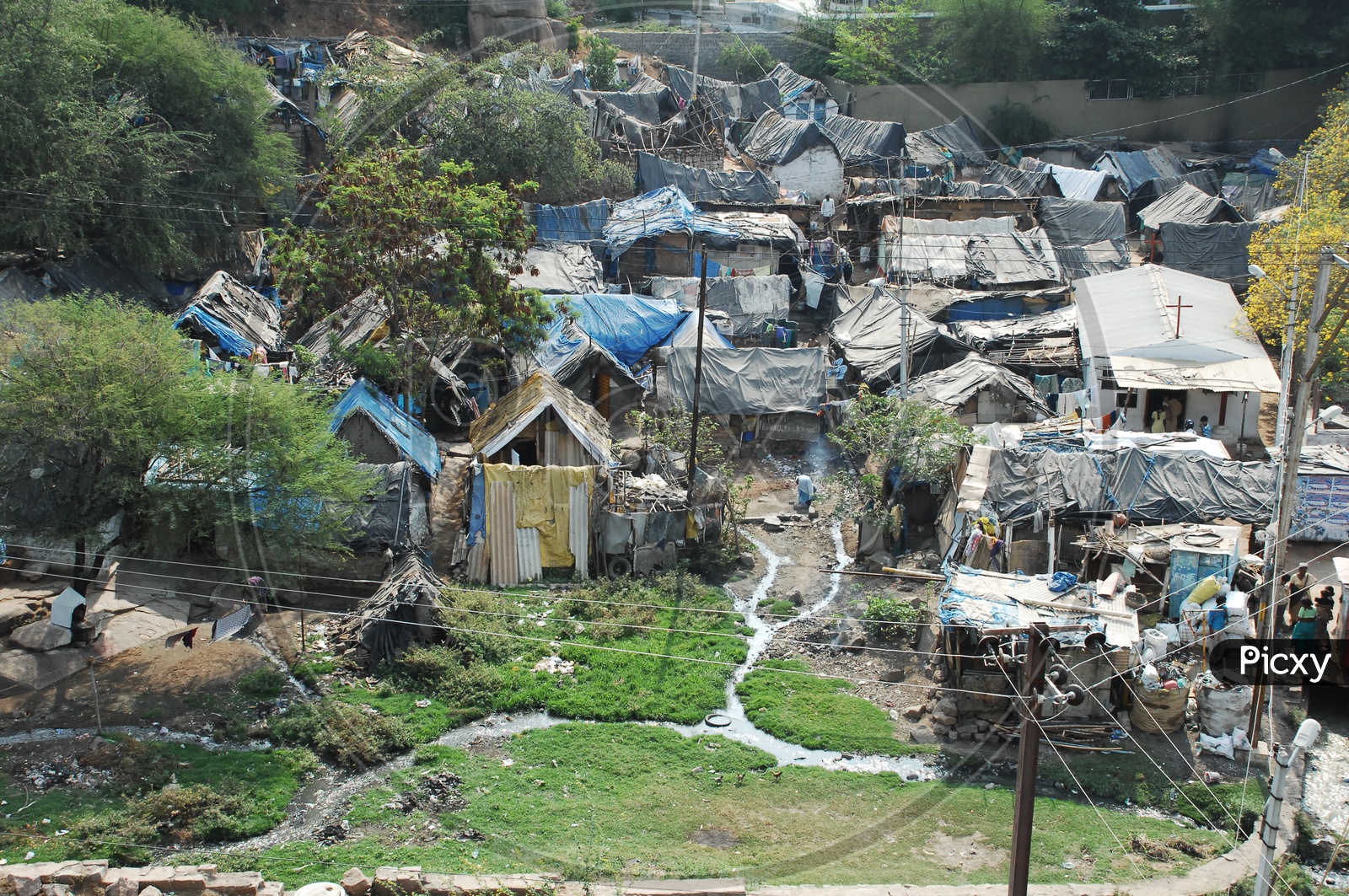 Huts in a Slum Area or Slum Area Huts