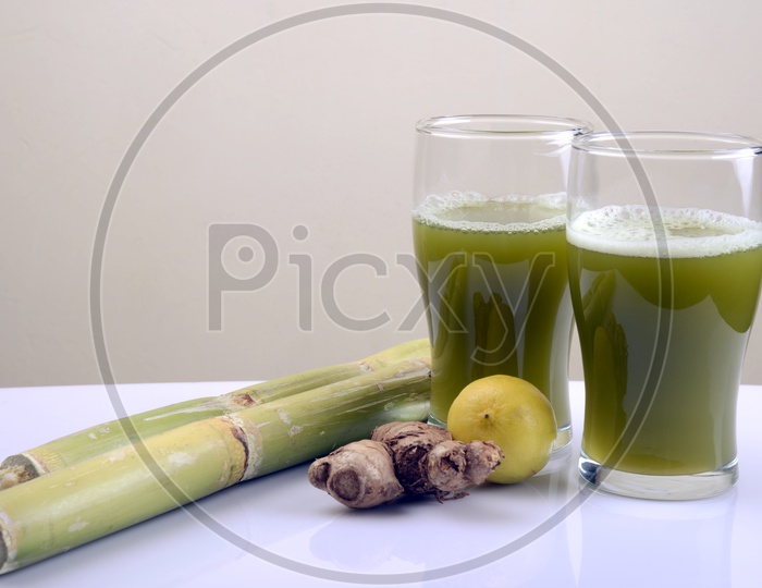 Sugarcane juice with lemon ,  ginger and sugar cane
