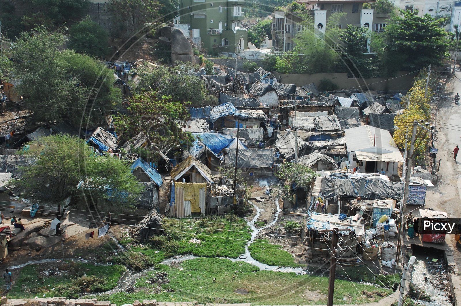 Huts in a Slum Area or Slum Area Huts