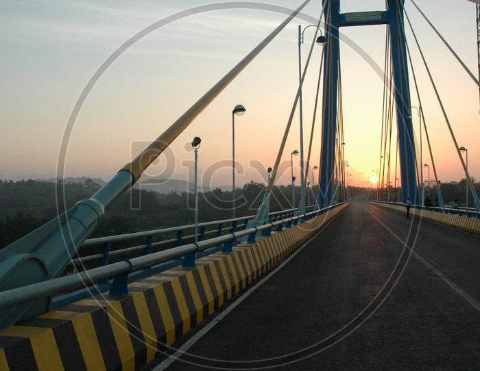 Cable stayed bridge connecting Aldona and Corjuem during sunset