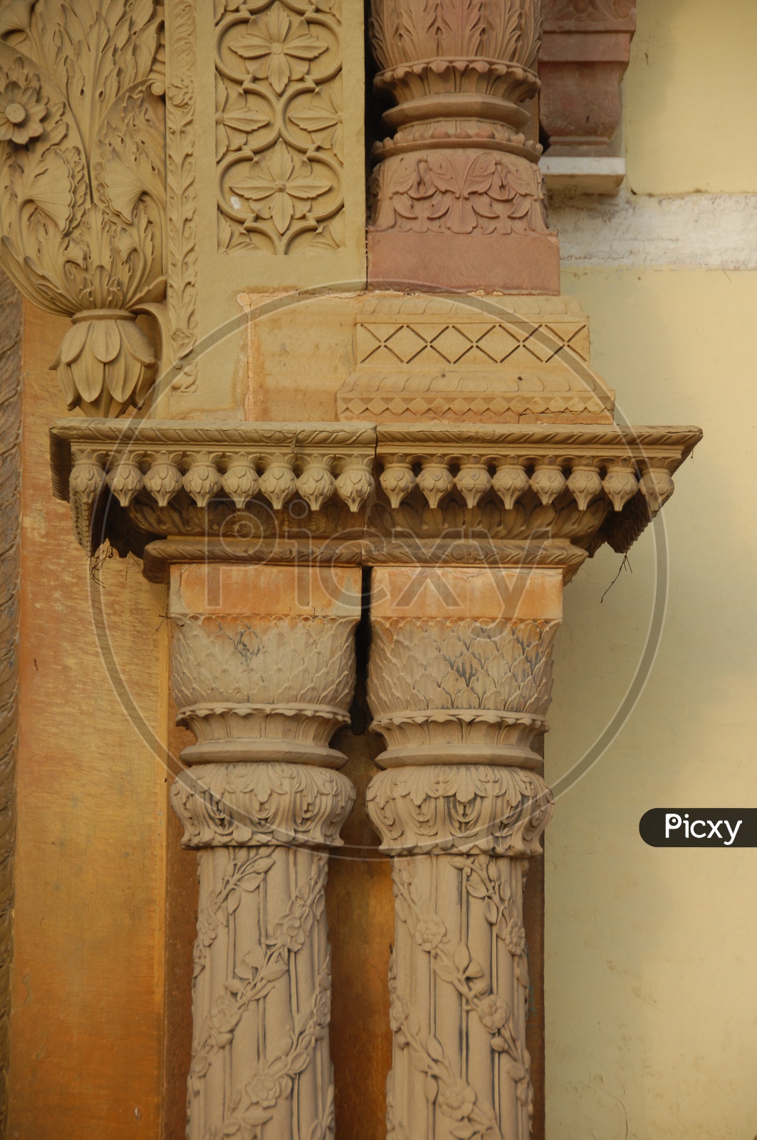 Wall carvings on the pillars of an ancient building