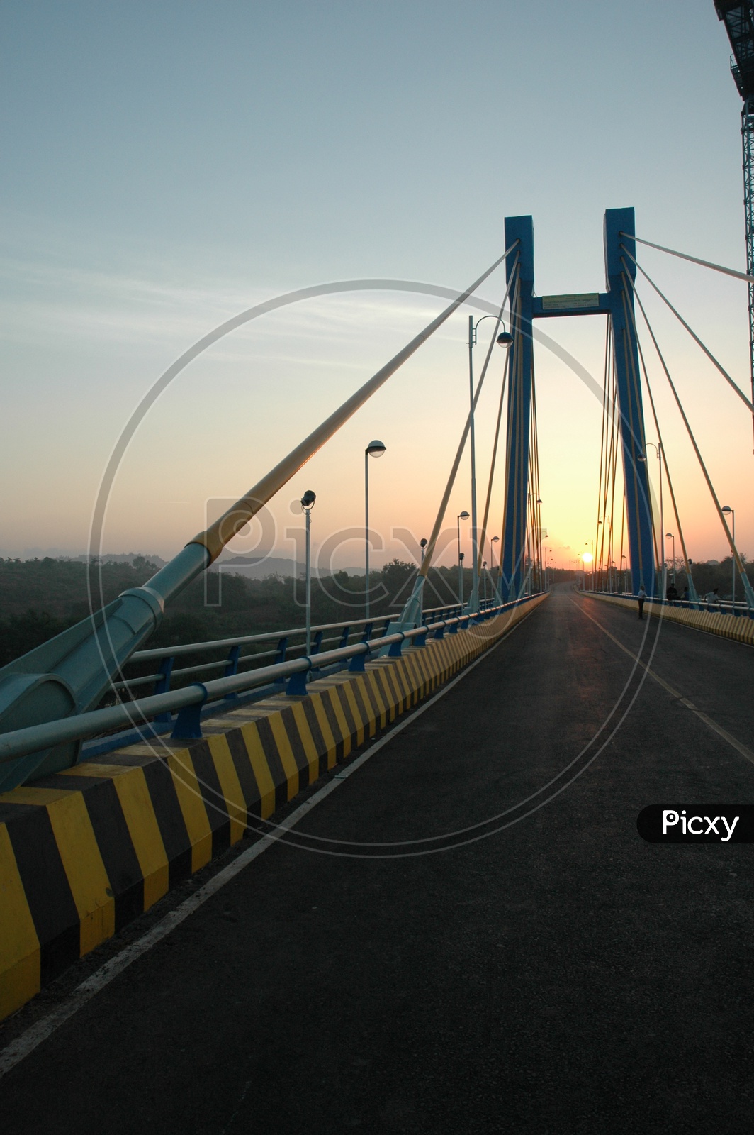 Cable stayed bridge connecting Aldona and Corjuem during sunset