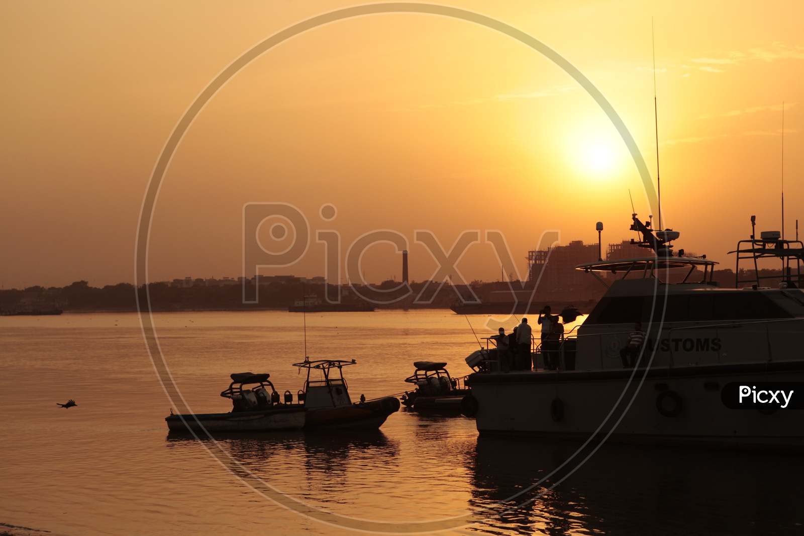 Customs Boats alongside the Hooghly River during the sunset