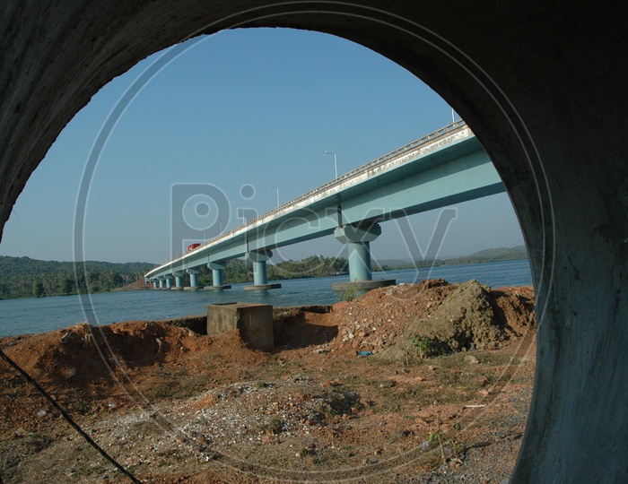 Tunnel view of the Mandovi bridge over the Mandovi river in Goa
