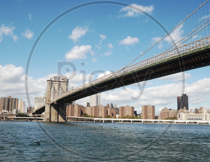 Beautiful view of Brooklyn bridge with river in the foreground